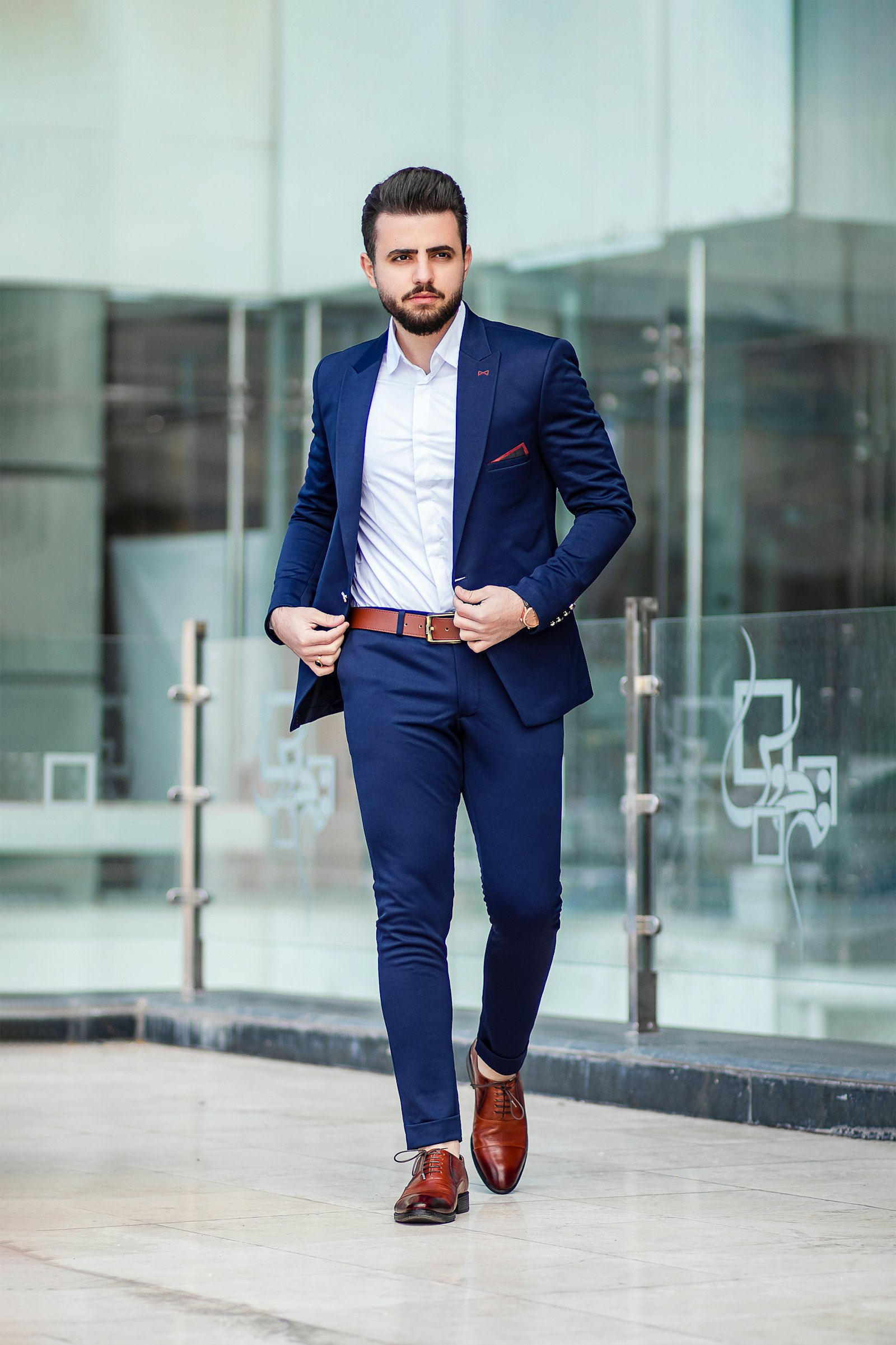 Man wearing a hand-tailored navy wool suit